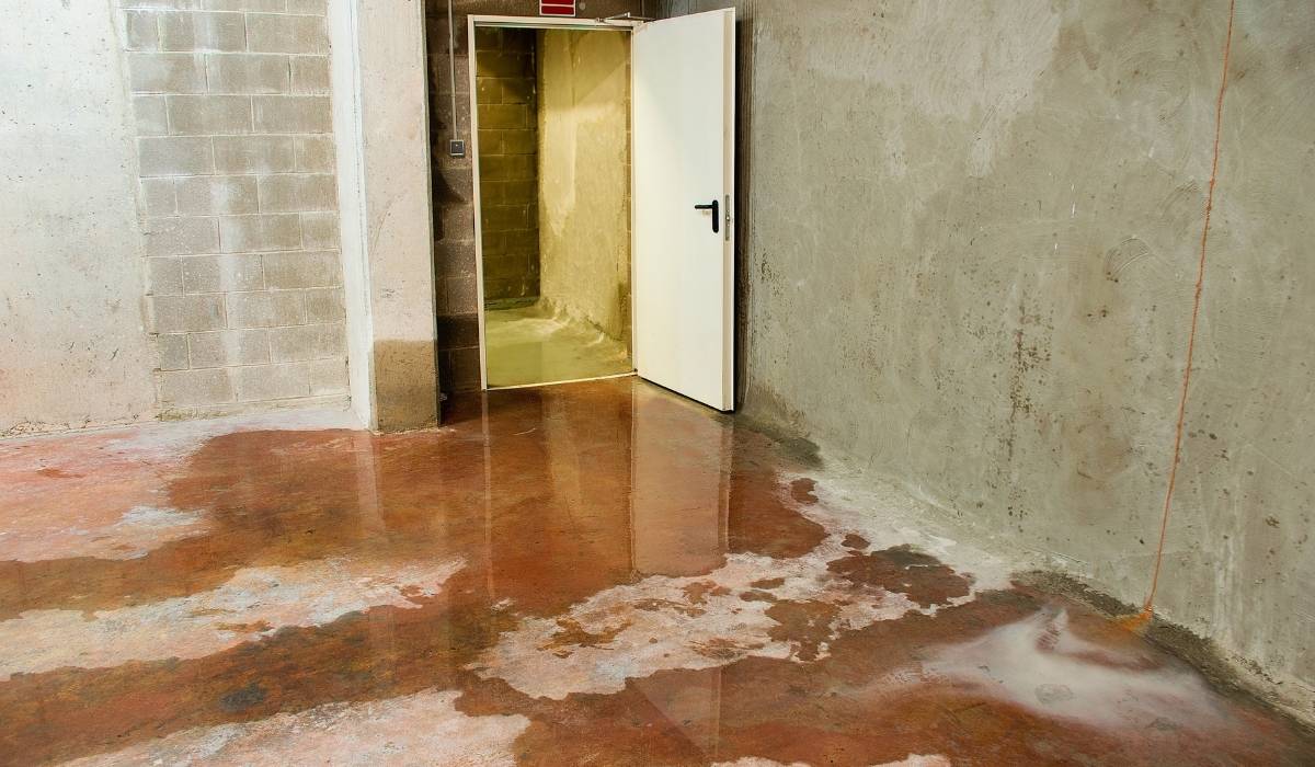 basement-water-intrusion-standing-water-concrete-floor